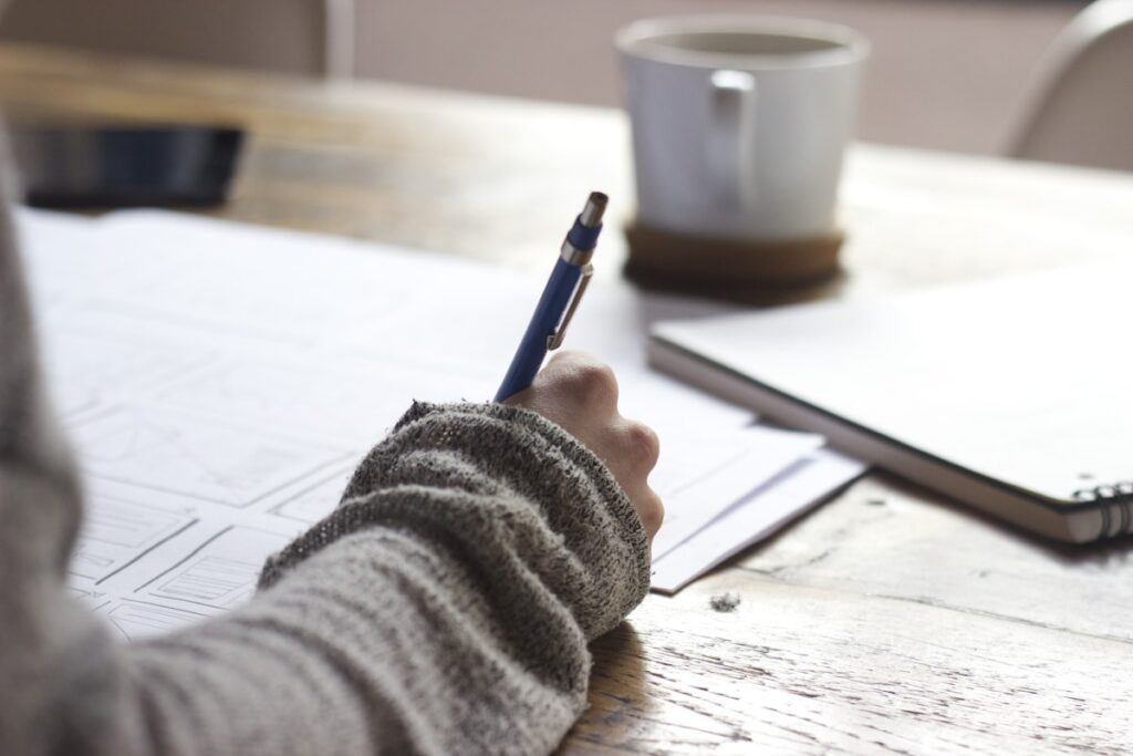 Person studying with focus and concentration at a desk
